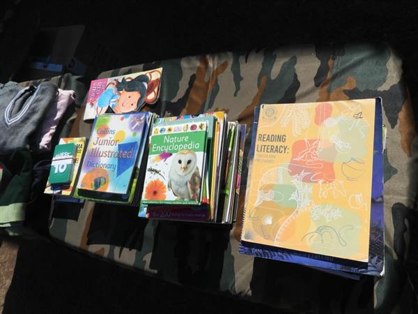 Distribution of Books & Woolen Clothes