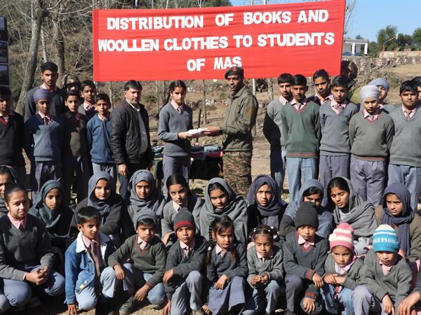 Distribution of Books & Woolen Clothes